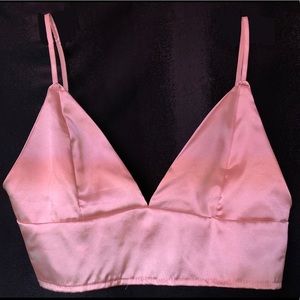 Pink cropped bralette.